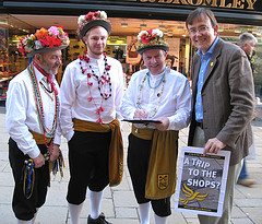 Martin Tod collects signatures from Christmas Clog Morris Dancers in Winchester High Street